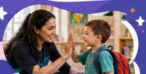 Teacher giving a baby a high-five
