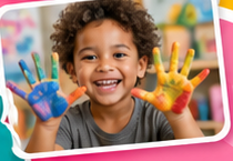 Child showing painted hands